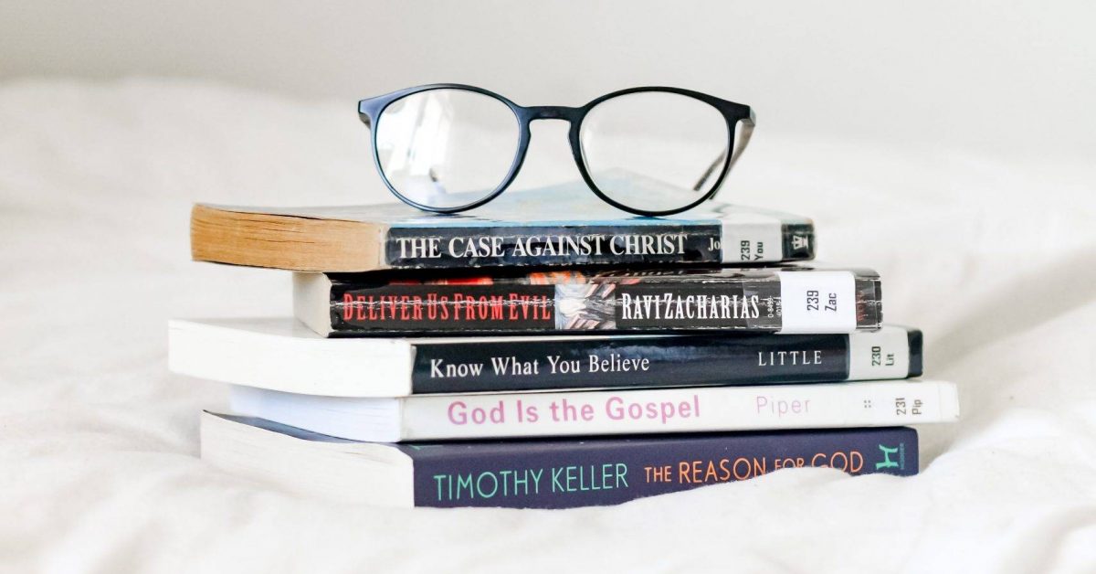 black framed eyeglasses on books